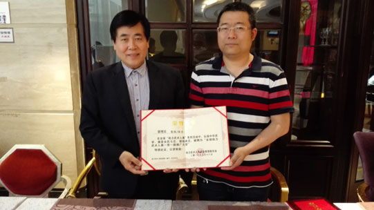 一带一路工作委员会副主任梁增乐为助力武术入奥一带一路推广大使.jpg